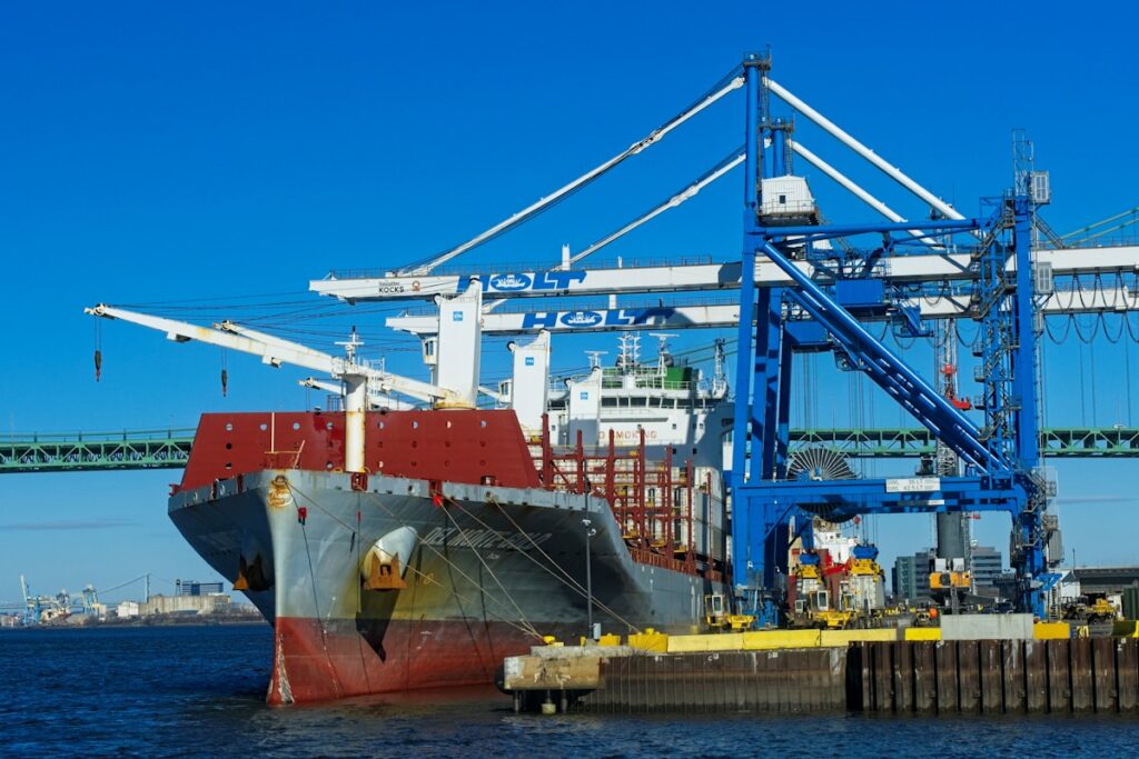 a large cargo ship docked at a dock